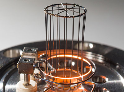 Elevating the Performance of Ionization Gauges with Simulation